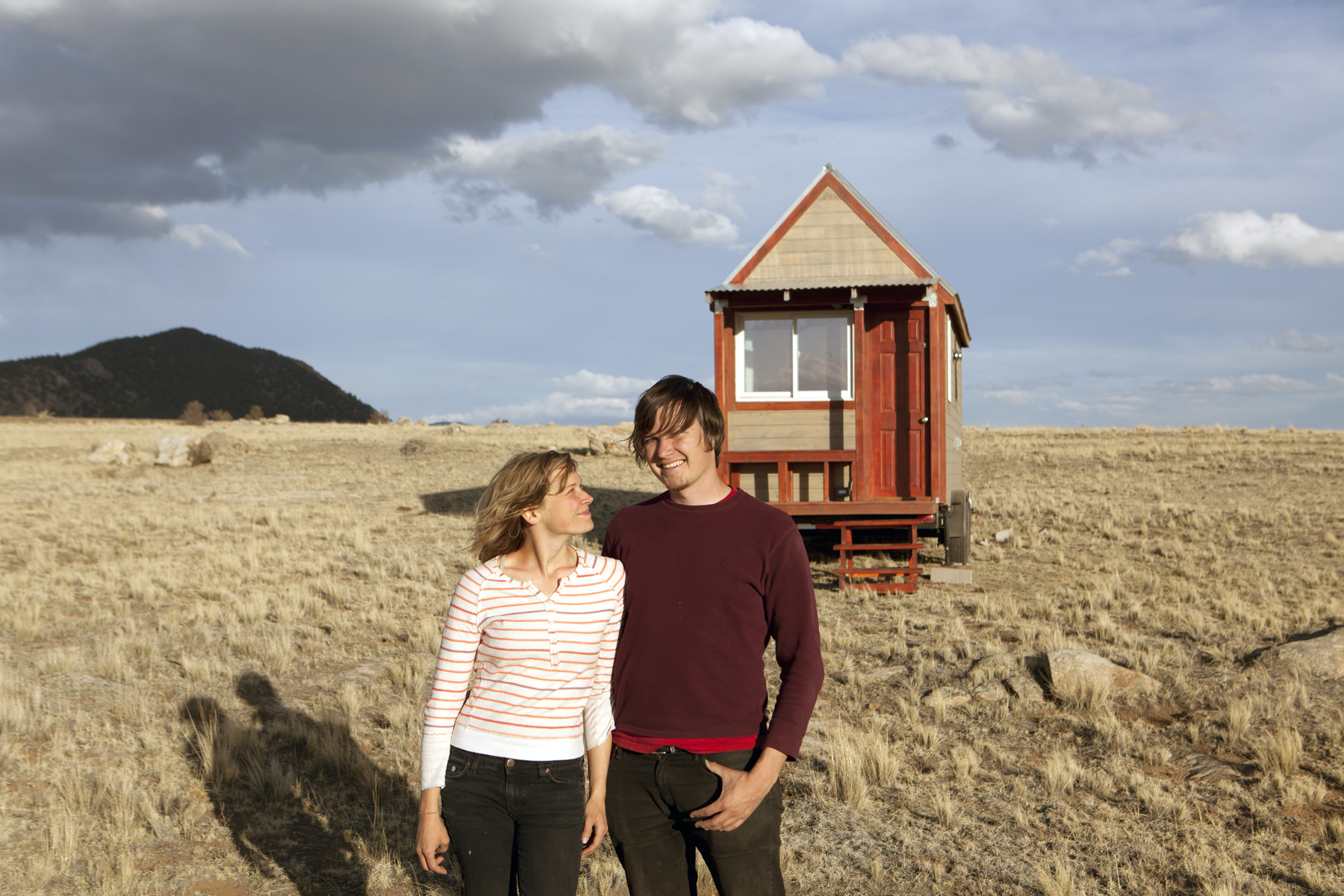 Merete & Chris in front of their "Tiny" house